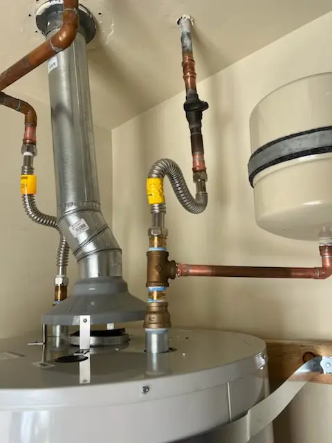 Water heater installation and plumbing repair in Hewes Park